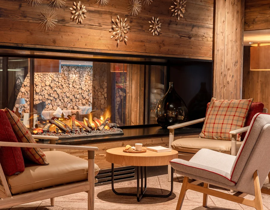 Лаунж с камином в Club Med Val d’Isère