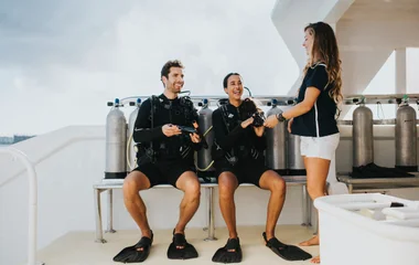 couple getting ready to scuba dive