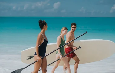 friends paddleboarding