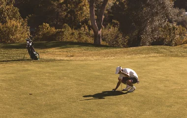 professeur de golf avec élève