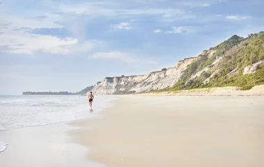 Pessoa na areia da praia