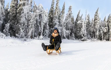 sledding in the snow