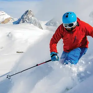 man skiing on the snowy slopes
