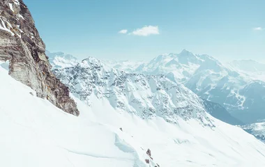 A beach with turquoise water and palm trees