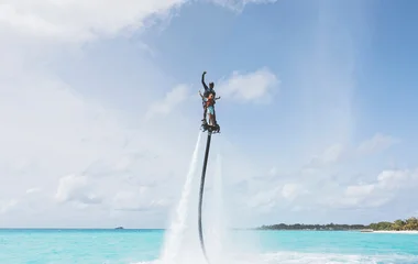 Tandem flyboard above the water