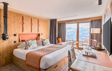 A beach with turquoise water and palm trees