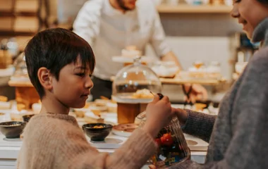 Child eating in the main restaurant ski resort