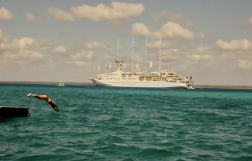 couple by the pool on holiday