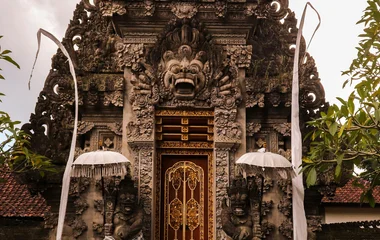 woman in front of sarswati temple in ubud