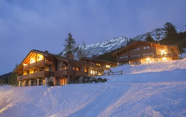 After a day of activity, unwind in cosy chalets with panoramic mountain views at Club Med Valmorel Chalet-Apartments.