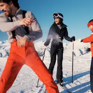 People on holiday skiing