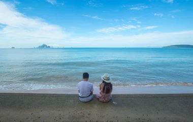 couple sitting on the beach