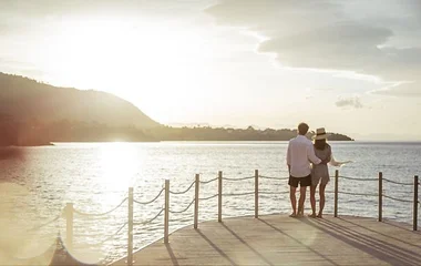 A couple enjoying the sunset at Club Med Luxury Resort