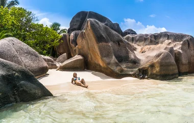 Lady sunbathing on the beach