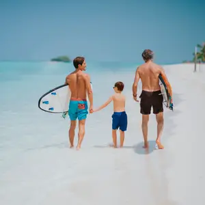 family surfing on holiday