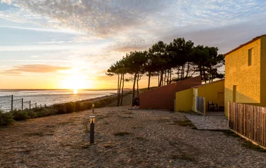 sunset on the beach in la palmyre France