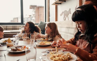 big family eating together at Club Med