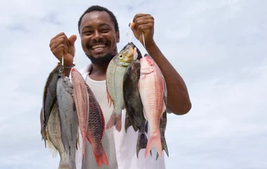 Creol man with fishes