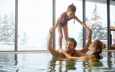 A family having fun in the pool in Club Med Les Arcs