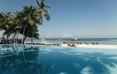Photo of a swimming pool and the ocean in Club Med Kani