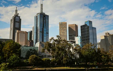 Picture of a park in Melbourne, with skyscrapers in the background