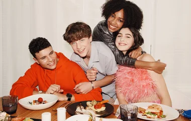 teens eating dinner together
