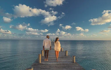 Couple Walking along pier