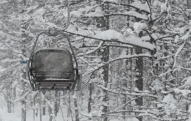 Ski lift in Japan forest snow