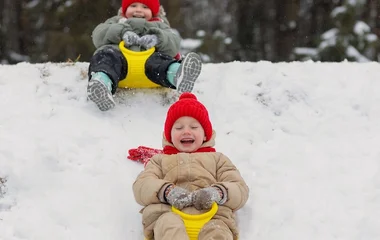 Kids playing with sleds