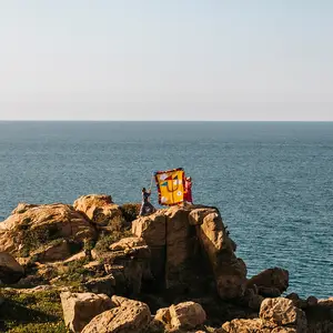 four artistic interpretations of the Club Med Trident