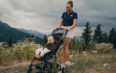 Baby on stroller.