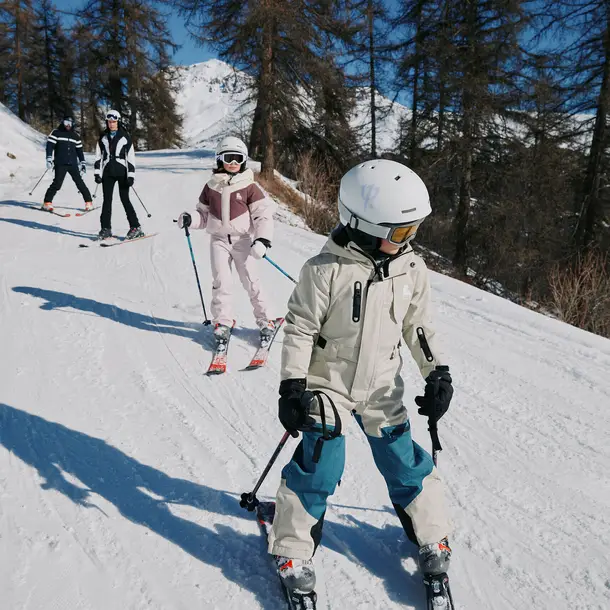 family skiing in the Alps